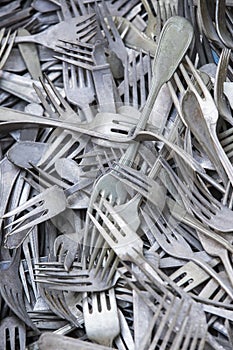 Background of old dirty cutlery photo