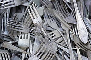 Background of old dirty cutlery photo