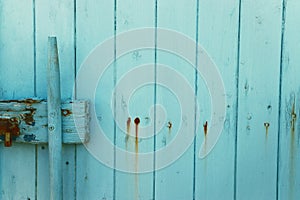 Background of old light blue grunge wooden texture. part of antique old door