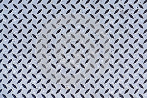 Background of old metal diamond plate in gray color