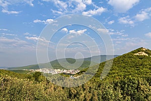 Background, old mountains, gorge city, blue sky.