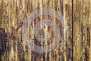 Background from an old painted wooden wall. Brown abstract background. Vintage wooden dark horizontal boards. Wood background