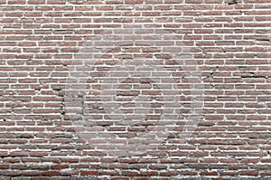 Background old real texture of a red brick wall