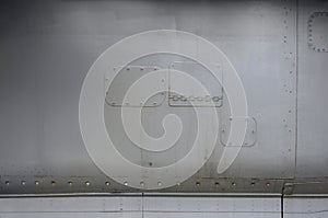 Background of old sheet iron fastened with rivets.