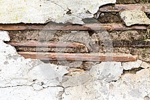 Background of old tiles with cement mortar with collapsed plaster, close-up, side view
