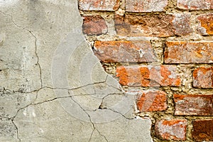 Background of old vintage brick wall with concrete,Weathered texture of racked concrete vintage brick wall background