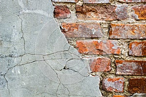 Background of old vintage brick wall with concrete,Weathered texture of racked concrete vintage brick wall background