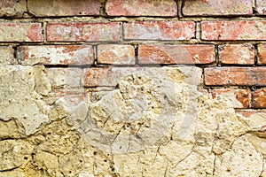 Background of old vintage brick wall with concrete,Weathered texture of racked concrete vintage brick wall background