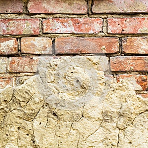 Background of old vintage brick wall with concrete,Weathered texture of racked concrete vintage brick wall background