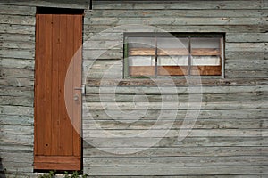 Background of old wall with window and door