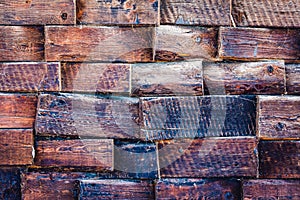 Background of old weathered boards with remnants of blue paint.