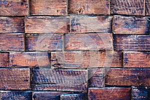 Background of old weathered boards with remnants of blue paint.