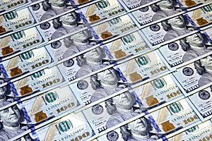 Background of one hundred dollars banknotes