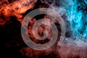 Background of orange, purple, red and blue wavy smoke on a black isolated ground. Abstract pattern of steam from vape of smoothly