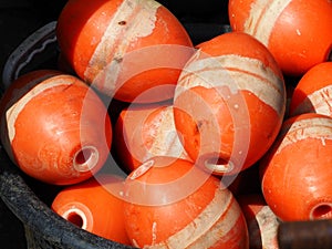 Background of ornage color fishing nets floats buoy