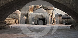 Background of an outer rim desert science fiction frontier outpost with buildings and structures . photo