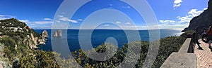 Background panoramic view of the sea and the Faraglioni rocks in the town of Capri on the island of Capri, Campania