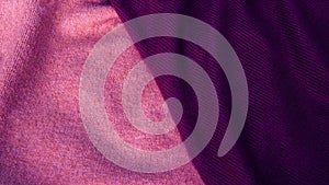 Background in pastel shades of pink and purple from silk fabric. Textile, copy space from silk fabric. Background for text