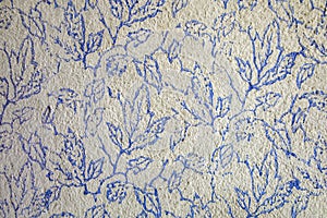 blue roller ornaments on the wall