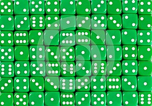 Background pattern of 70 green dices, random ordered