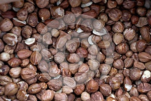 Background and pattern of raw peeled hazelnuts