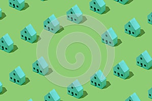 Background pattern of small green model houses