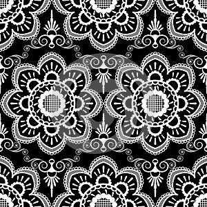 Background pattern with white mehndi seamless lace decoration items on black background.