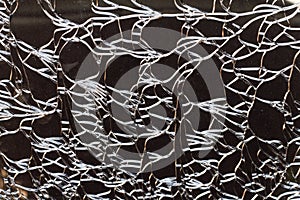 Background patterned glass cracking.