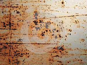 Background of peeling paint and rusty old meta. Little black dots and scratches. Corrosion of metal, abstract background, texture photo