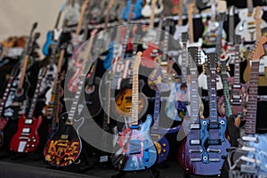 Background picture for a music store that sells guitars from different manufacturers.