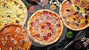Background Pizza. Set of delicious pizzas with bacon, cheese and mushrooms.