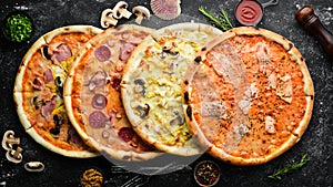 Background Pizza. Set of delicious pizzas with bacon, cheese and mushrooms.