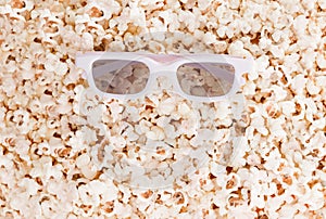 Background. Popcorn and 3d glasses top view, and place for text.Flat lay. Copyspace