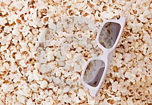 Background. Popcorn and 3d glasses top view, and place for text.Flat lay. Copyspace