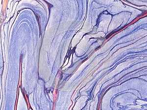 Background of purple splashes of paint. Fragment of artwork