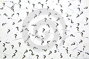 A background of question mark signs
