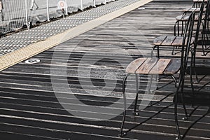 The background of railway platform for comfortable waiting seat for a coming train in a Japaneses train station