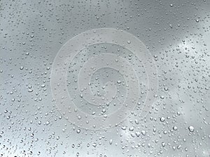 Background with rain drops on window pane