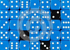 Background of random ordered blue dices with three black cubes