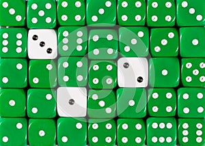 Background of random ordered green dices with three white cubes