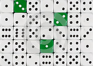 Background of random ordered white dices with three green cubes