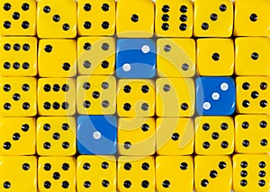 Background of random ordered yellow dices with three blue cubes