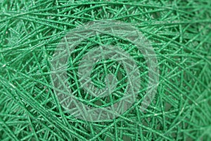 Background of randomly arranged fibers green.