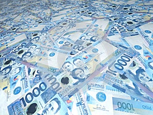 A background of randomly scattered 1000 Philippine peso bills. Philippine currency. Paper money or banknotes of the Philippines photo