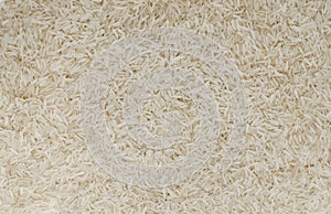 Background Raw basmati rice. Concept of Water-Conserving Products. Saving water.