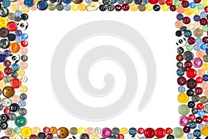 Background with rectangular frame - multicolored buttons on a white surface