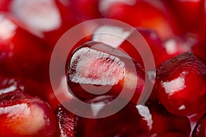 Background of a red juicy ripe pomegranate seeds