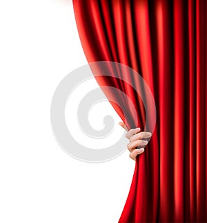 Background with red velvet curtain and hand.