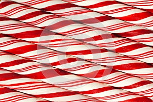 Background of red and white striped Christmas candy canes