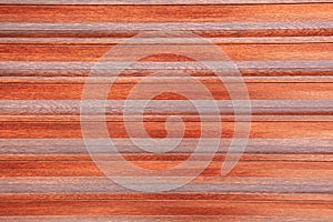 Background of a red wooden surface with a lot of lines